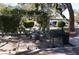 Cozy outdoor patio area with a pergola, mature trees, and barbecue, perfect for entertaining at 2851 S Valley View Blvd # 1134, Las Vegas, NV 89102