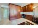 Bedroom/office combo features a built in wall bed with integrated cabinets and a desk area at 3111 Bel Air Dr # 201, Las Vegas, NV 89109