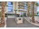 Elegant entrance to Regency Towers with well-manicured landscaping and prominent building signage at 3111 Bel Air Dr # 201, Las Vegas, NV 89109
