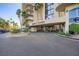 Circular driveway leading to the Regency Towers entrance with lush landscaping at 3111 Bel Air Dr # 201, Las Vegas, NV 89109
