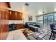 Spacious living area with modern furnishings, a built-in desk and plenty of natural light at 3111 Bel Air Dr # 201, Las Vegas, NV 89109