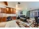 Bright living room featuring a comfortable sofa, stylish decor, and a built-in workspace at 3111 Bel Air Dr # 201, Las Vegas, NV 89109