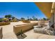 Relaxing outdoor patio area with comfortable lounge chairs and charming yellow canopies, perfect for enjoying sunny days at 3111 Bel Air Dr # 201, Las Vegas, NV 89109