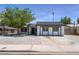 Charming single-story home featuring a well-maintained yard and ample parking at 313 Agora Way, Las Vegas, NV 89110