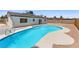 Backyard pool features a sun deck, providing a relaxing and inviting outdoor space at 313 Agora Way, Las Vegas, NV 89110
