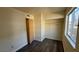 Bedroom with closet and updated wood look flooring at 3412 Mercury St # I, North Las Vegas, NV 89030