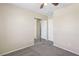 A carpeted bedroom with a mirrored closet and white doors at 3609 Kingfishers Catch Ave, North Las Vegas, NV 89084