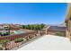 Spacious patio overlooking a backyard with a pool, gazebo, and greenery at 3609 Kingfishers Catch Ave, North Las Vegas, NV 89084