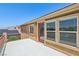 Spacious patio looking out over the backyard and neighborhood at 3609 Kingfishers Catch Ave, North Las Vegas, NV 89084