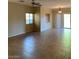 A bright living room featuring tile floors and neutral paint colors at 3813 Juanita May Ave, North Las Vegas, NV 89032