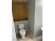 Bathroom with a toilet, countertop, and decorative wall at 3941 Copper Stone Ct, North Las Vegas, NV 89032