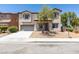Charming two-story home features a low-maintenance yard, stucco exterior, and attached two-car garage at 3941 Copper Stone Ct, North Las Vegas, NV 89032