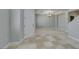 Large, light-filled space with stylish tile floor and contemporary lighting, ideal for entertaining and relaxing at 3941 Copper Stone Ct, North Las Vegas, NV 89032
