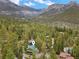 Aerial view of a home with lush trees, nestled in a desirable mountain community at 401 Alpine Way, Mount Charleston, NV 89124