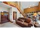 Inviting living space with a rustic log cabin design, featuring high ceilings and an open layout at 401 Alpine Way, Mount Charleston, NV 89124