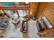 Aerial view of a living area featuring log walls, a wood-burning stove, and comfortable seating at 401 Alpine Way, Mount Charleston, NV 89124
