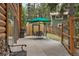 Cozy outdoor patio with dining set, offering an ideal space for enjoying meals in a serene setting at 401 Alpine Way, Mount Charleston, NV 89124