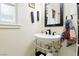 Cozy bathroom featuring a unique sink with metal stand and Americana themed decor at 517 5Th St, Boulder City, NV 89005