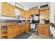 Inviting kitchen features stainless steel appliances, light wood cabinets, and an open layout at 517 5Th St, Boulder City, NV 89005