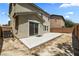 New concrete patio and brick perimeter for a low maintenance backyard at 5824 Gemstone Peak St, North Las Vegas, NV 89031