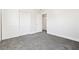 Bedroom featuring carpet flooring, natural light, closet, and neutral walls at 5824 Gemstone Peak St, North Las Vegas, NV 89031