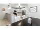 Bright kitchen featuring white cabinetry, stainless appliances, and adjacent dining area at 620 Painted Cloud Pl, Las Vegas, NV 89144