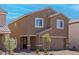 Exterior view showing neutral paint, low maintenance yard and drought tolerant landscaping at 6246 Blood Lily Ave, Las Vegas, NV 89122