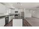 Bright kitchen featuring stainless appliances, quartz countertops and luxury vinyl flooring at 6246 Blood Lily Ave, Las Vegas, NV 89122