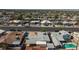 A sunny aerial view of the houses in the area, some with swimming pools in their backyards at 6317 Alta Dr, Las Vegas, NV 89107
