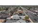 Street view of a neighborhood with houses and cars on a sunny day with many houses visible at 6317 Alta Dr, Las Vegas, NV 89107