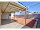 Spacious covered patio with ample seating in a large backyard at 6317 Alta Dr, Las Vegas, NV 89107