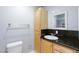 Bathroom with granite vanity and tile backsplash at 6317 Alta Dr, Las Vegas, NV 89107