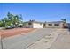 Charming single story home with an expansive driveway and well maintained exterior at 6317 Alta Dr, Las Vegas, NV 89107