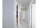 Hallway with marble tile flooring, providing access to various rooms at 6317 Alta Dr, Las Vegas, NV 89107