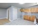 Updated kitchen with granite countertops, stainless steel appliances, and marble tile flooring at 6317 Alta Dr, Las Vegas, NV 89107