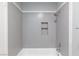 Shower features updated fixtures, stylish tilework and recessed storage at 6317 Alta Dr, Las Vegas, NV 89107