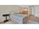 Well-lit bedroom featuring a comfortable bed, dresser, and clean carpets at 7113 Carrondale Way, Las Vegas, NV 89128