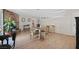 Open dining area with table and chairs, flowing into kitchen and living spaces at 7113 Carrondale Way, Las Vegas, NV 89128