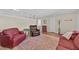 Inviting living room showcasing ample seating and a warm, welcoming atmosphere at 7113 Carrondale Way, Las Vegas, NV 89128