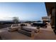 Outdoor patio area, complete with seating and a breathtaking view at 720 Dragon Peak Dr, Henderson, NV 89012