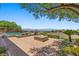 Stunning backyard with pool, fire pit, and mountain views is perfect for outdoor living and entertaining at 73 Kittansett Loop, Henderson, NV 89052