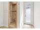 Bathroom with a glass shower and private exterior access at 73 Kittansett Loop, Henderson, NV 89052