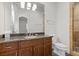 Bathroom with granite countertops and a glass shower at 73 Kittansett Loop, Henderson, NV 89052