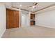 Bedroom featuring custom built-ins and ceiling fan for added comfort at 73 Kittansett Loop, Henderson, NV 89052
