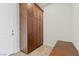 Hallway featuring storage cabinet and wood bench at 73 Kittansett Loop, Henderson, NV 89052