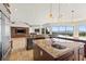 Expansive gourmet kitchen with island, granite counters and stainless steel appliances at 73 Kittansett Loop, Henderson, NV 89052