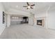 Spacious living room with a fireplace, and upper floor view at 73 Kittansett Loop, Henderson, NV 89052