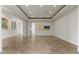 Bright living area offering tray ceilings, recessed lighting, and seamless open floor plan at 73 Kittansett Loop, Henderson, NV 89052