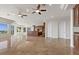 Open living room featuring recessed lighting, tile floors, and kitchen at 73 Kittansett Loop, Henderson, NV 89052