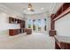 Comfortable and well lit home office with plenty of built-ins and access to an outdoor patio at 73 Kittansett Loop, Henderson, NV 89052